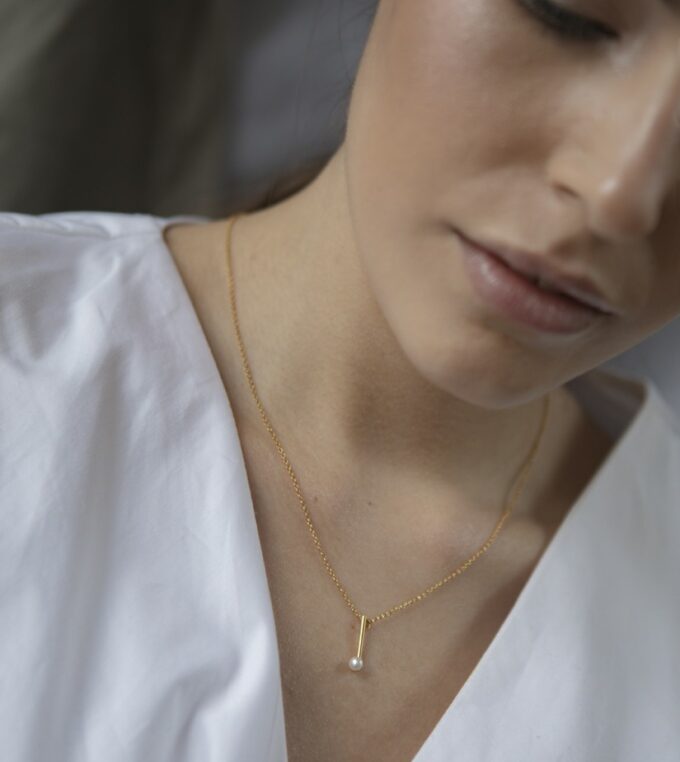 Naszyjnik linia i perła pozłacany